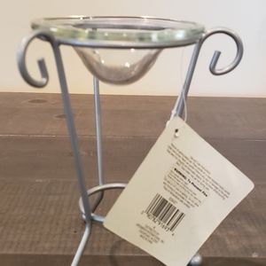 Candle and oil holder